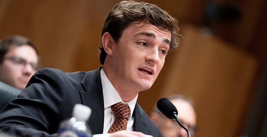 Nick Shirley testifying at a microphone before a U.S. Senate committee